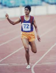  “Shiny Wilson Leads Indian Contingent as Captain at 1992 Barcelona Olympics”