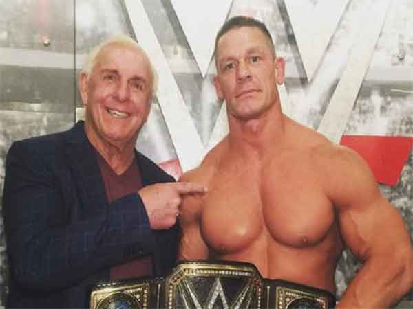  “Passing the Torch: Ric Flair Congratulates John Cena on Historic 17th World Championship Win”