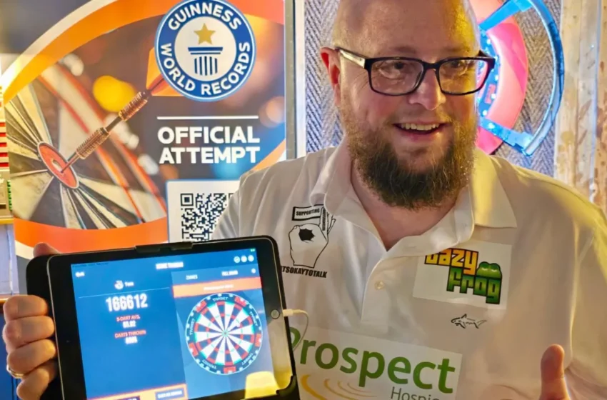  “Bullseye Marathon: Man Aims True in 12-Hour Darts World Record Attempt”