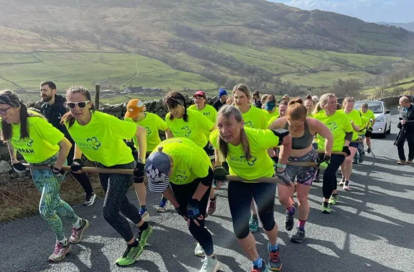  “Driven to Greatness: Women Set World Record by Hauling Car Over High Mountain Pass”