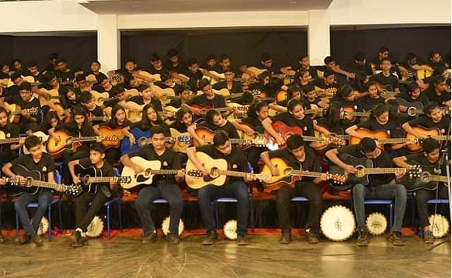 100 Students Set World Record for Largest Guitar Ensemble Performing National Anthem in Belgaum
