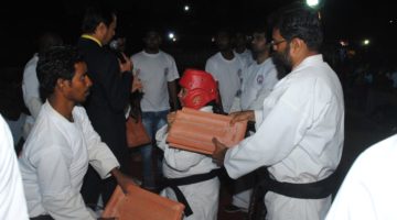  Maximum Mangalore Roof Tiles Broken on Body in One Minute by Sensei Kalpana