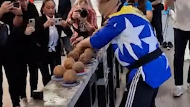  Blindfolded and Unstoppable: Man Smashes 48 Coconuts with One Hand to Set World Record