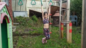 Eight-Year-Old Girl’s Monkey Bar Feat Denied World Record Due to Age