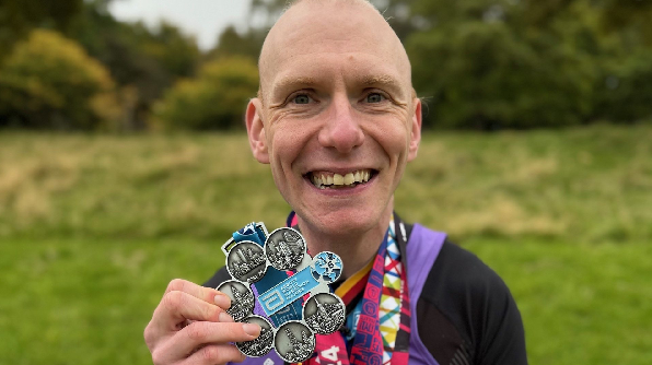  Andrew Tomlinson Breaks Marathon World Record and Makes History with Six Star Medal
