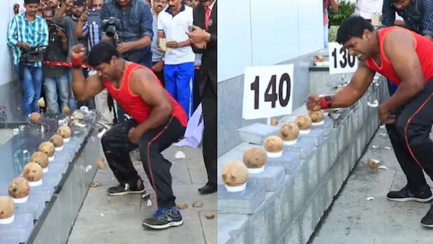  Kerala Strongman Smashes World Record: 122 Coconuts Crushed in One Minute with One Hand!