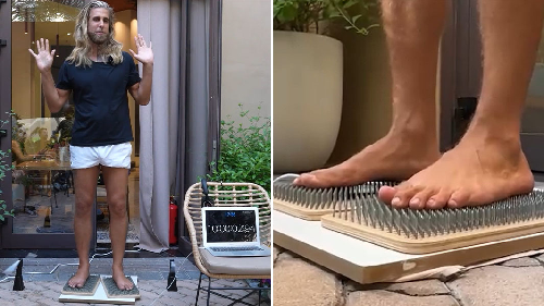  French Man Sets Record After Standing 13 Hours on Nail Board