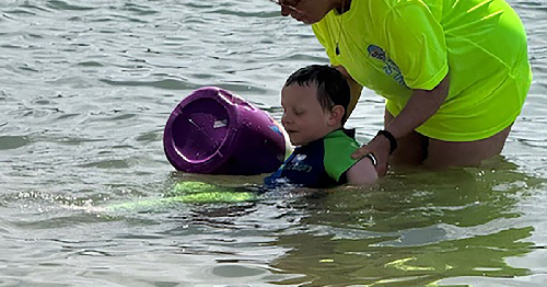  Dover City Beach Hosts World Record Swim Lesson for Water Safety Awareness