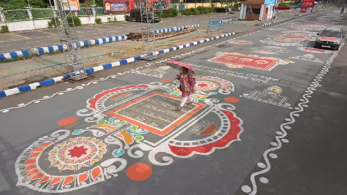  AI-Generated Alpona Transformed Into Massive Street Mural by 16 Artists