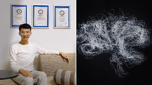  Chinese Artist Pei Haozheng Sets Third World Record with Longest Paper Strip