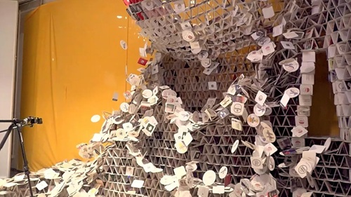  Girl Accidentally Topples 63,000-Beer-Coaster Tower Built for Guinness World Record Attempt