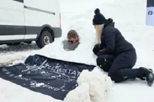  “Super Cool” Scots Nurse Attempts World Record After Lying in Snow for Hours