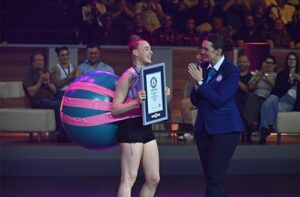 Woman Fearlessly Somersaults Over Exercise Ball to Claim Unique World Record
