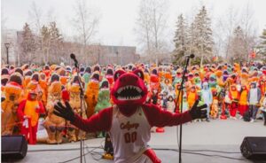 University Sets Guinness Record with 682 People in Dinosaur Costumes